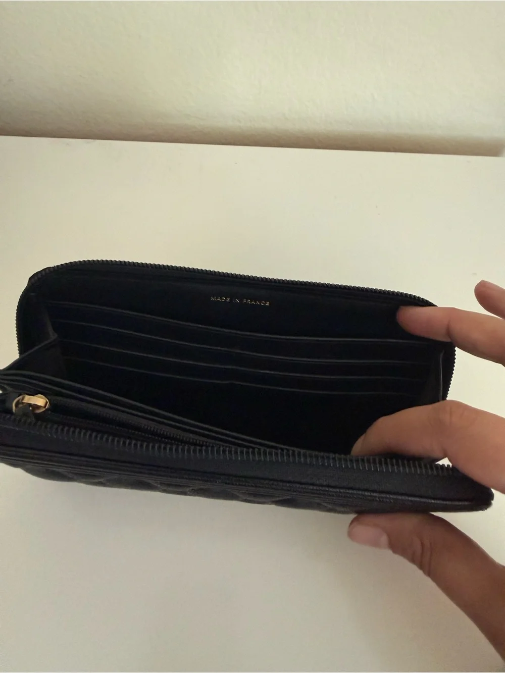 CHANEL Black Quilted Zip-Around Wallet with Gold CC Lock